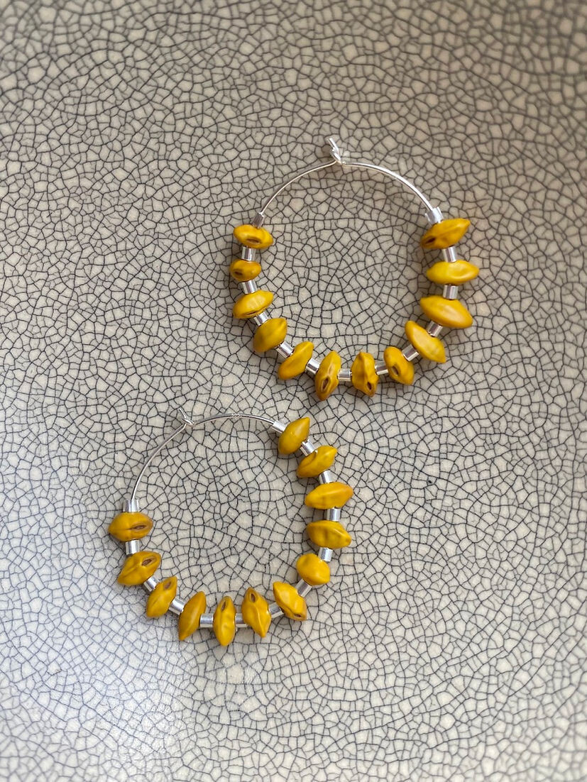 Silver hoops with kowhai flower inspired yellow beads